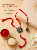 El Regalo Red Lumba Rakhi Set For Bhaiya Bhabhi - German Silver Rakhi Combo Set with Roli Chawal, Message Card in Rakhi Gift Box