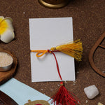 El Regalo 1 PC Designer Tassel Moli Rakhi, Hamsa Hand Moli Rakhi for Bhaiya - Rakshabandhan Red & Yellow Thread Rakhi with Message Card & Roli Chawal Shagun in Rakhi Box