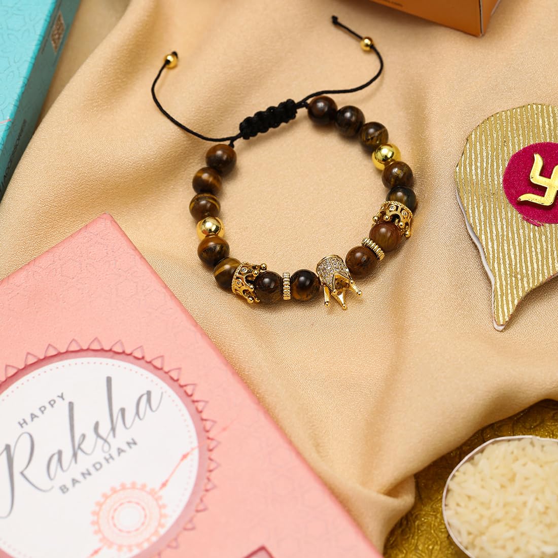 El Regalo 1 PC Natural Stones AD King Crown Rakhi for Brother/Bhai- Designer Handcrafted Natural Stones Rakhi with Roli-Chawal Shagun, Rakhi Message Card in Rakhi Gift Box (Brown & Golden)