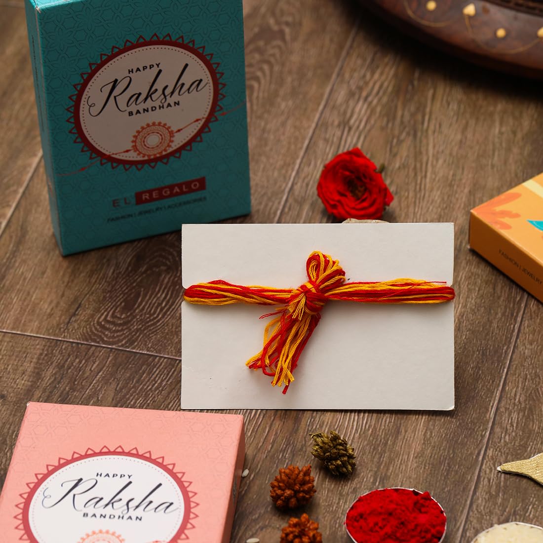 El Regalo 1 PC Moli Rakhi for Bhaiya - Rakshabandhan Moli Charms Rakhi with Message Card & Roli Chawal Shagun in Rakhi Box (Red Evil Eye Moli Rakhi)