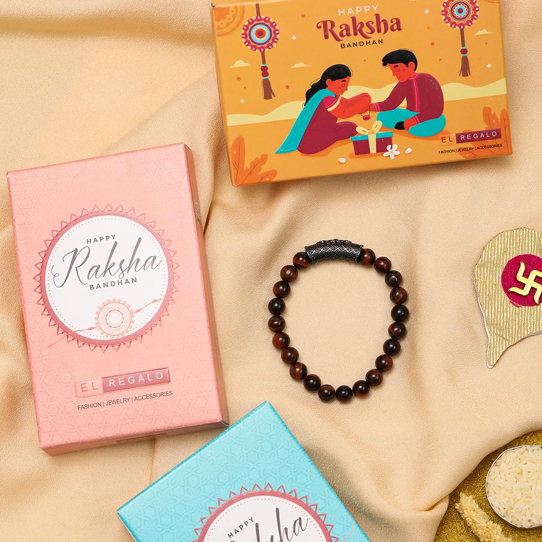 El Regalo 1 PC Natural Red Tiger Eye Stones with Antique Crown Charm Rakhi for Brother/Bhai- Designer Rakhi with Roli-Chawal Shagun, Rakhi Message Card in Rakhi Gift Box (Antique Charm Rakhi)