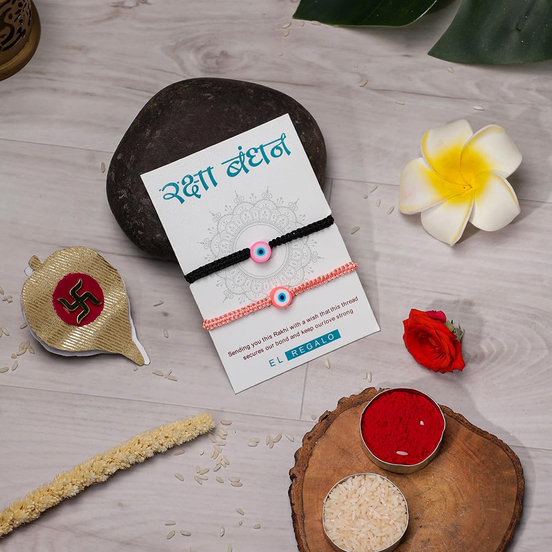 El Regalo 2PCs Rakhi Combo Set for Bhai-Bhabhi or Bhai-Bhatija/Bhatiji- 2 Evil Eye Rakhis Set with Roli Chanwal, Rakhi Card in Rakhi Gift Box (Option-3)