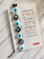 El Regalo Rakhi for Brother - Evil Eye Rakhi for Bhai/Bhabhi with, shagun & Message Card in Rakhi Gift Box (Black White Mix Evil Eye Rakhi)