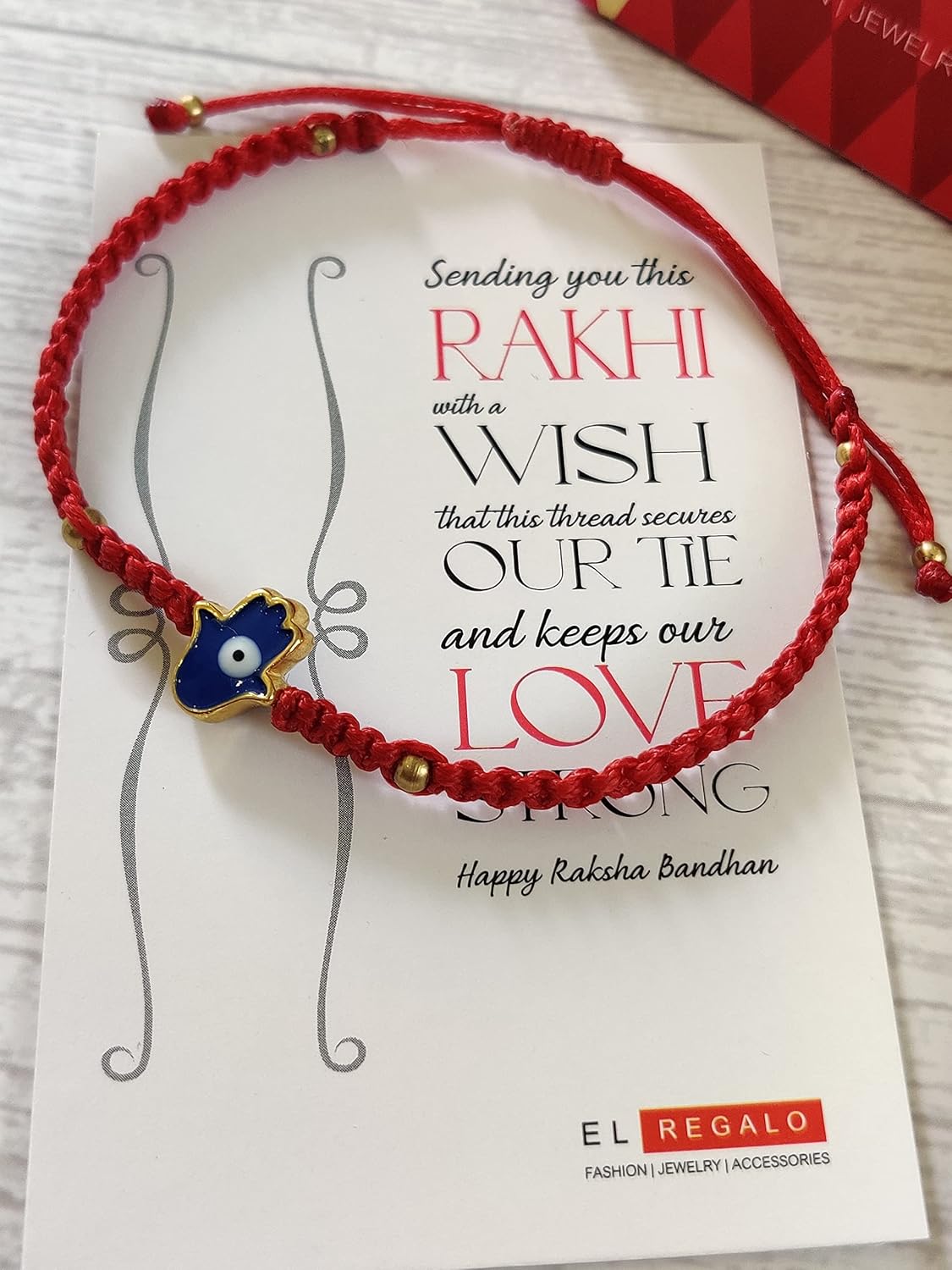 El Regalo Evil Eye Hamsa Hand Rakhi with shagun, Rakhi Message Card in a Rakhi Box for Brother- Enameled Hamsa Hand Rakhi for Brother/Bhai/Bhabhi/Bhaiya/Bhatija/Nephew