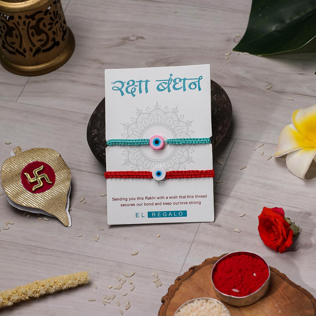 El Regalo 2PCs Rakhi Combo Set for Bhai-Bhabhi or Bhai-Bhatija/Bhatiji- 2 Evil Eye Rakhis Set with Roli Chanwal, Rakhi Card in Rakhi Gift Box (Option-4)