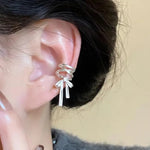 El Regalo Fashionable & Elegant Silver Matt Finish Ear Cuffs for Non Piercing Earrings- Ballet Hollow Cross Ribbon Ear Clips for Girls, Trendy Versatile Clip On Cuff Earrings for Girls & Women