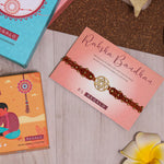 El Regalo 1PC Chakra Rakhi for Brother- Designer Chakra Reiki Healing Symbols Hand Braided Rakhi with shagun, Rakhi Card in Gift Box for Bhaiya/Bhabhi/Niece/Nephew (Sacral Chakra)