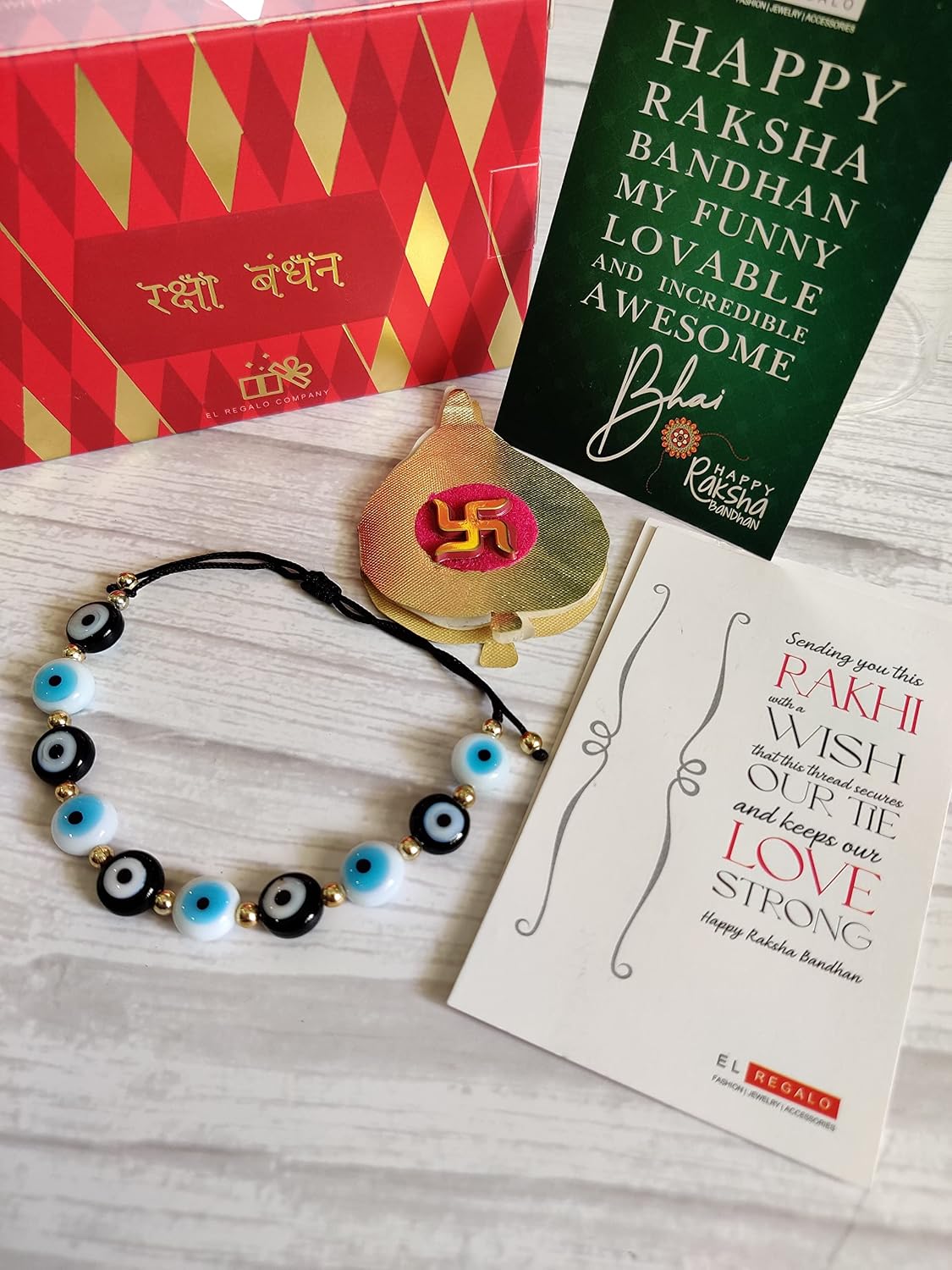 El Regalo Rakhi for Brother - Evil Eye Rakhi for Bhai/Bhabhi with, shagun & Message Card in Rakhi Gift Box (Black White Mix Evil Eye Rakhi)