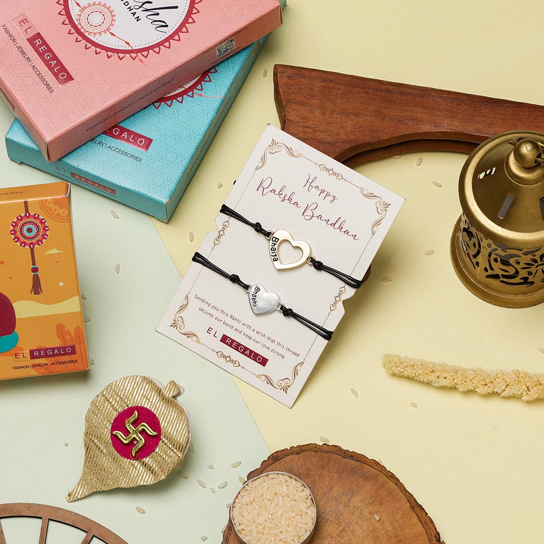 El Regalo 2PC Minimalist Matchin Hearts Bhaiya Bhabhi Rakhi Set- Bhaiya & Bhabhi Engraved Heart Rakhis with Roli-Chawal Shagun Pack, Rakhi Message Card in Rakhi Gift Box for Brother & Sister-in-law