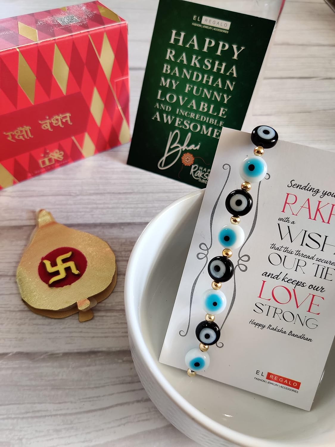 El Regalo Rakhi for Brother - Evil Eye Rakhi for Bhai/Bhabhi with, shagun & Message Card in Rakhi Gift Box (Black White Mix Evil Eye Rakhi)