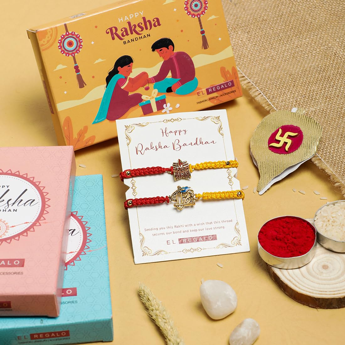 El Regalo 2PCs Red & Yellow Thread Bracelet Rakhi Combo Set for Brother- Auspicious OM, Ganesha, Shree, Trident, Damroo Mauli Rakhi with Roli Chawal Shagun, Message Card in Rakhi Gift Box (Option-1)