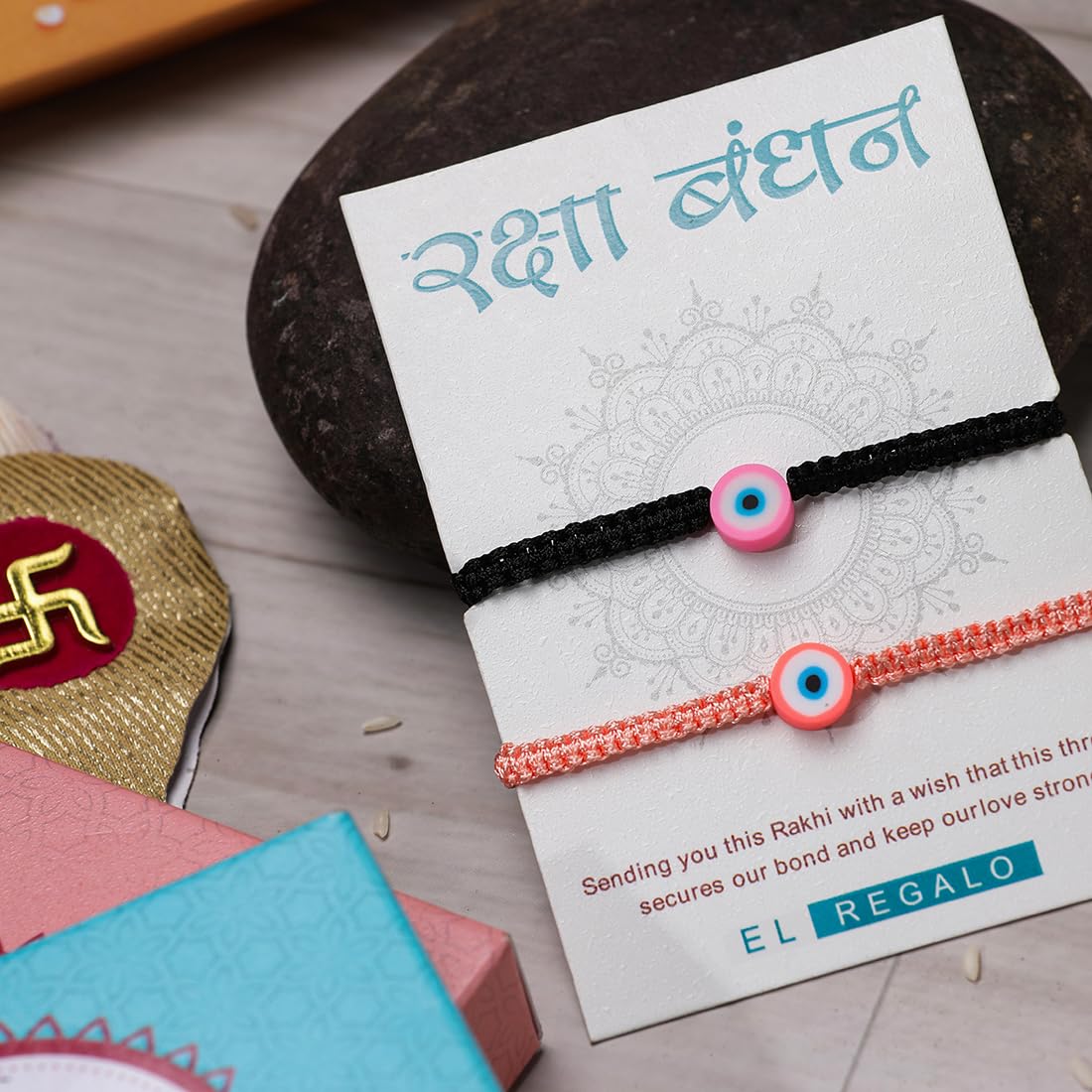 El Regalo 2PCs Rakhi Combo Set for Bhai-Bhabhi or Bhai-Bhatija/Bhatiji- 2 Evil Eye Rakhis Set with Roli Chanwal, Rakhi Card in Rakhi Gift Box (Option-3)