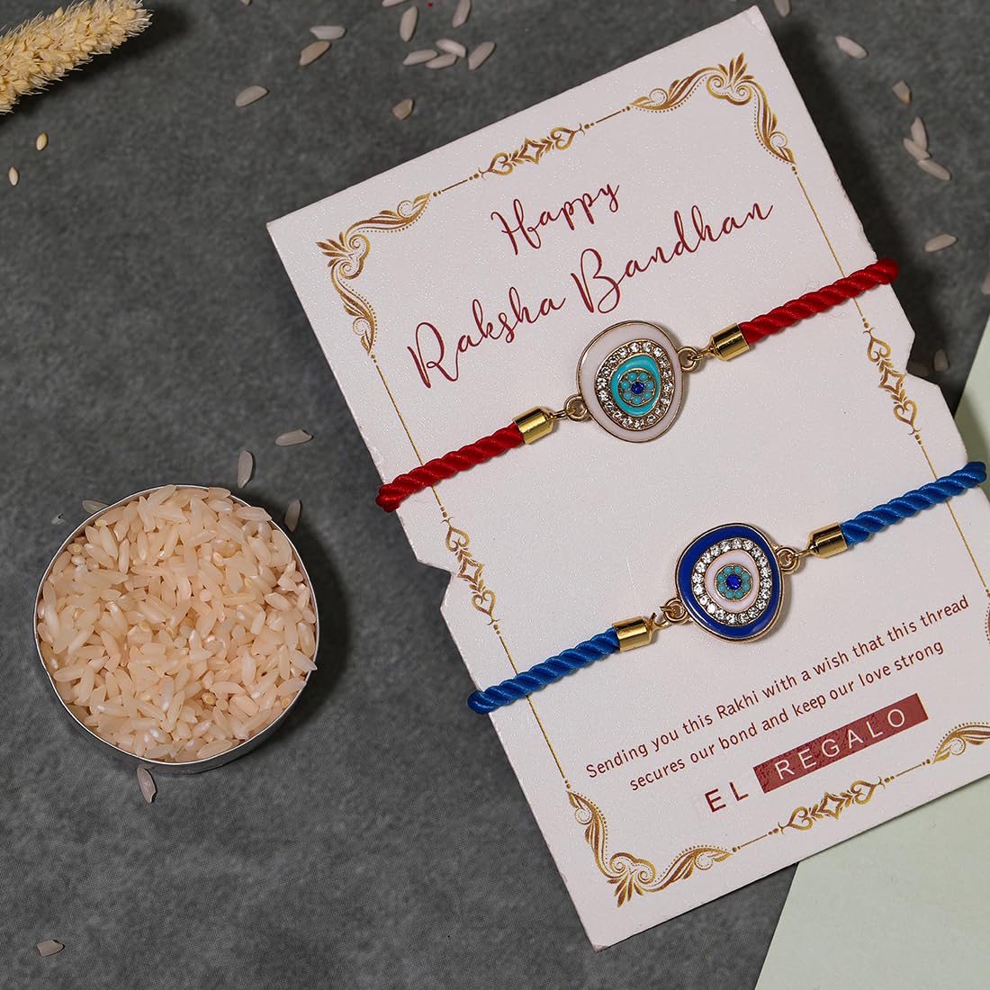 El Regalo 2PCs Designer Evil Eye CZ Rakhi Combo Set for Brothers/Bhaiya-Bhabhi/Brother-Nephew with Roli Chawal, Rakhi Message Card in Rakhi Gift Box