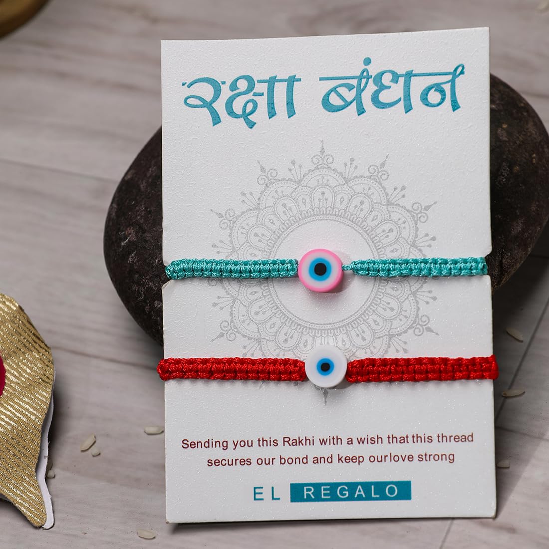 El Regalo 2PCs Rakhi Combo Set for Bhai-Bhabhi or Bhai-Bhatija/Bhatiji- 2 Evil Eye Rakhis Set with Roli Chanwal, Rakhi Card in Rakhi Gift Box (Option-4)