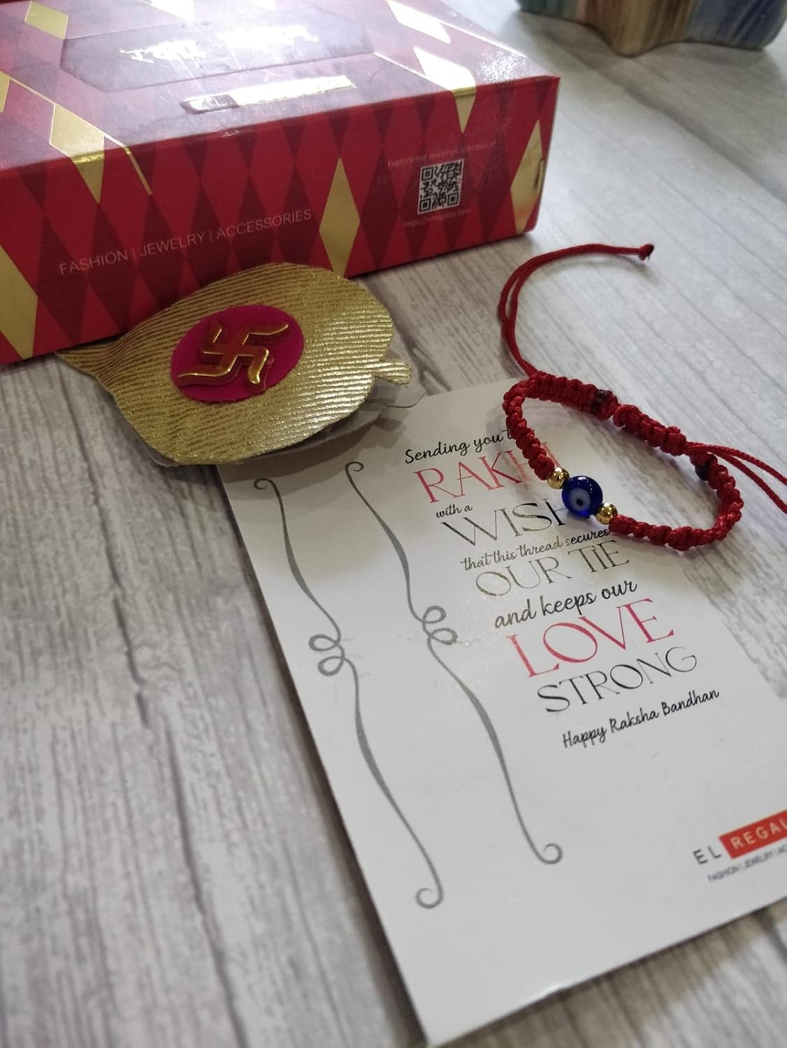 El Regalo Rakhi for Babies - beautiful Evil Eye Nazaria Rakhis for Little Brother/Niece/Nephew Rakhis for Kids/Babies/Toddlers (Red Evil Round)